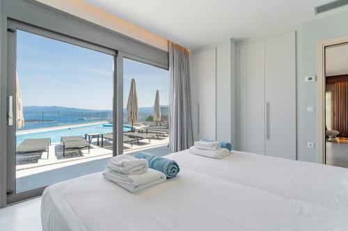 Ένα ή περισσότερα κρεβάτια σε δωμάτιο στο Villa Marianna