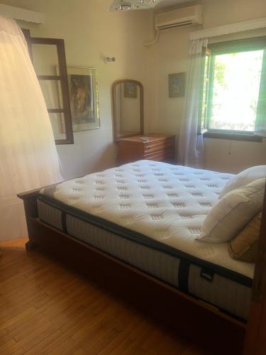 Cama o camas de una habitación en Lagonisi2025