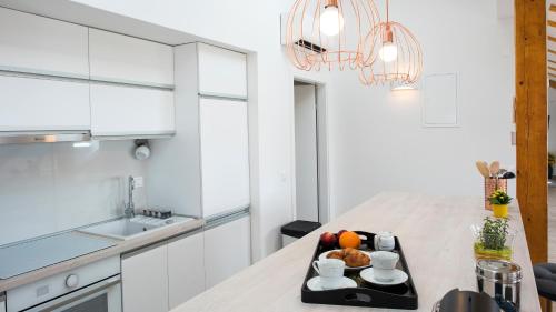 Kuchyň nebo kuchyňský kout v ubytování Flowers Dubrovnik Luxury Apartments
