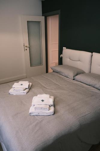 A bed or beds in a room at Swing 69 by PortofinoVacanze