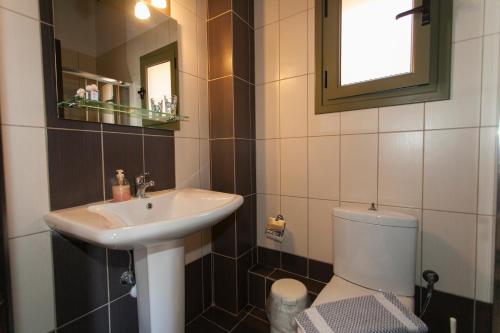 Koupelna v ubytování Siarbas Hotel