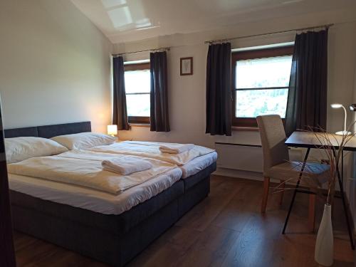 Katil atau katil-katil dalam bilik di Apartmány Podlavice