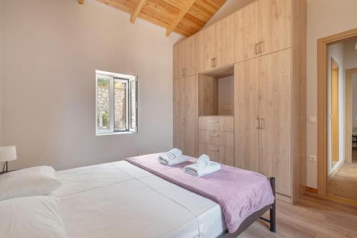 Postel nebo postele na pokoji v ubytování Ionian Home