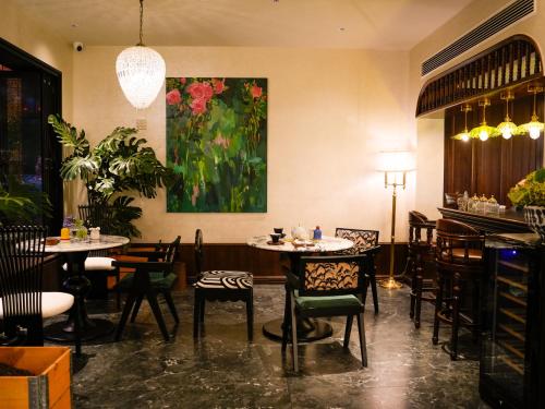 Ein Restaurant oder anderes Speiselokal in der Unterkunft Candy Homestay Zhangjiajie Complimentary Airport & Train Station Pickup 