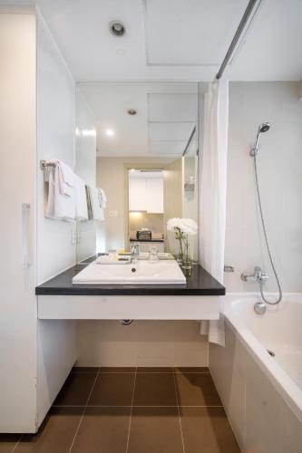 Ένα μπάνιο στο Phu My Hung - Saigon South Serviced Apartments 1 - Near Vivo City Mall
