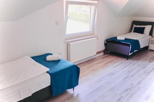 Postelja oz. postelje v sobi nastanitve Villa Saraj