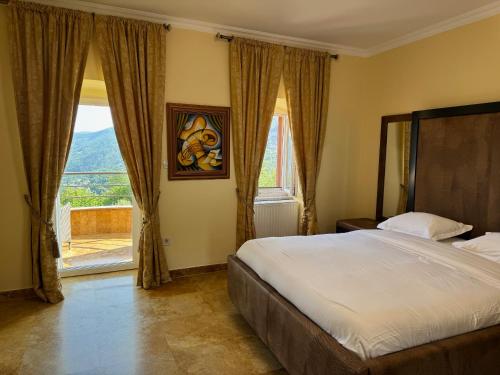 Postel nebo postele na pokoji v ubytování Apartments Villa BV