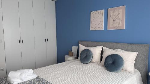 Postel nebo postele na pokoji v ubytování Maro Apartments Prishtina