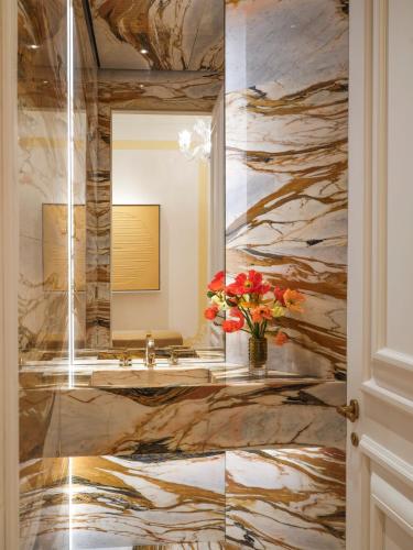 a bathroom with a sink and a mirror at Hotel Cipriani, A Belmond Hotel, Venice in Venice