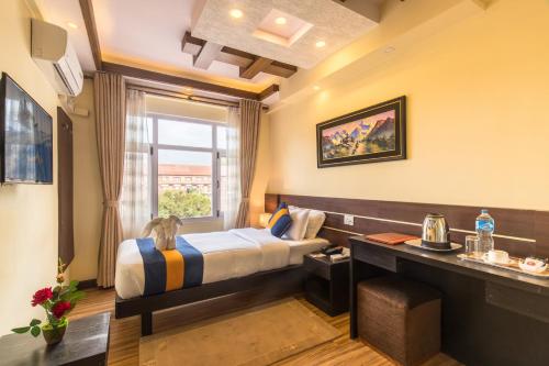 Postel nebo postele na pokoji v ubytování Devo Boutique Hotel