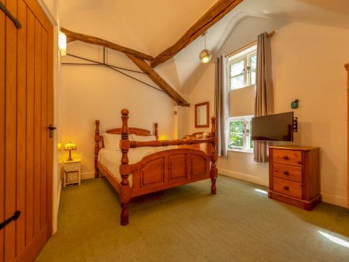 Ένα ή περισσότερα κρεβάτια σε δωμάτιο στο Squirrel Barn - Family Getaway Pass the Keys