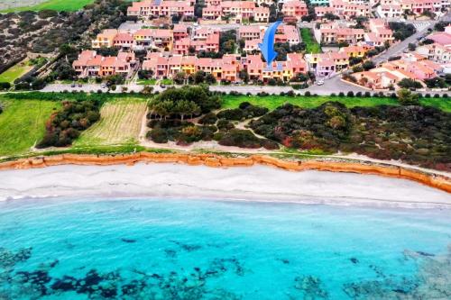 an aerial view of a beach with houses and the ocean at Funtana Meiga - Marina Breeze 50mt from sea in Funtana Meiga