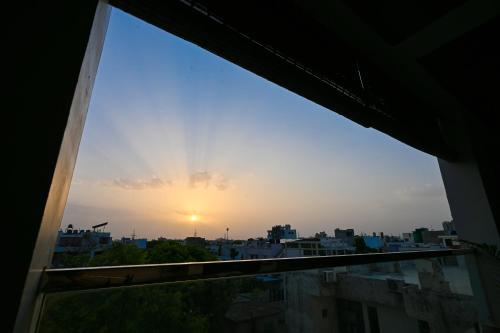 a view of the sunset from the balcony of a building at Harnawa Haveli - A Boutique Heritage Stay in Jaipur