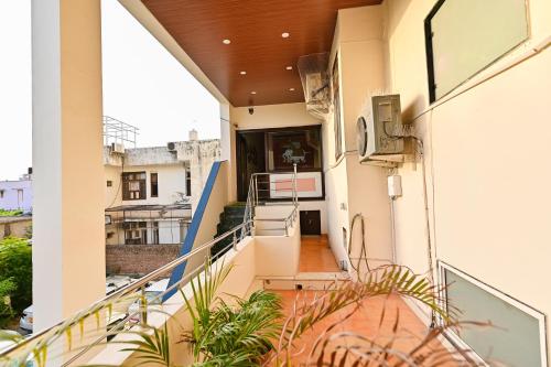 a balcony with a view of a building at Harnawa Haveli - A Boutique Heritage Stay in Jaipur