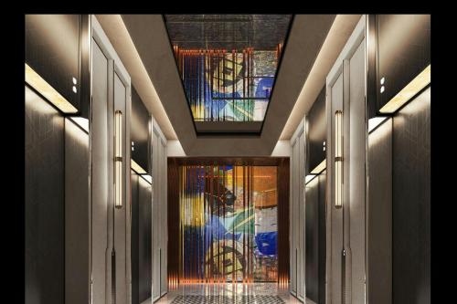 a hallway with a glass door with a stained glass window at JW Marriott Hotel and Suites Saigon in Ho Chi Minh City