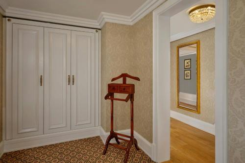 a room with a hallway with a ladder in it at Powerscourt Hotel, Autograph Collection in Enniskerry
