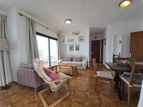 a living room filled with furniture and a piano at Costa Luz BL 4 6 in Puerto del Carmen