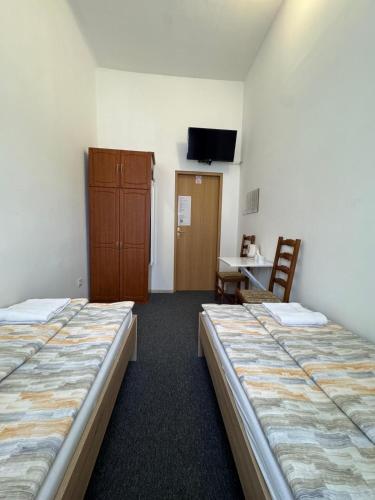 Cama o camas de una habitación en TOMISLAV