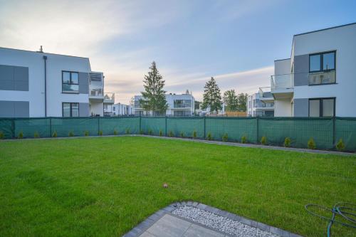 Κήπος έξω από το Baltic Essence Apartamenty 1