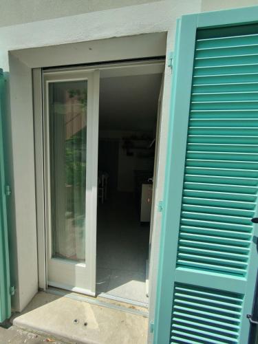 an open door to a room in a house at Casa Pitturini in Marciana Marina