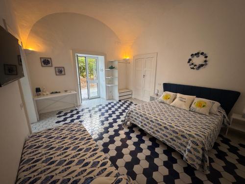 Ένα ή περισσότερα κρεβάτια σε δωμάτιο στο Maison Vittoria