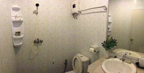 Koupelna v ubytování Baan Sala Lung Dam - Fisherman Village