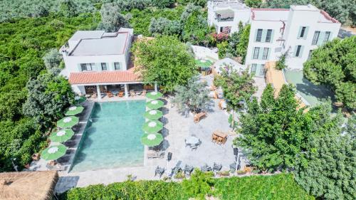 an aerial view of a house with a swimming pool at InOne Bitez Hotel in Bodrum City