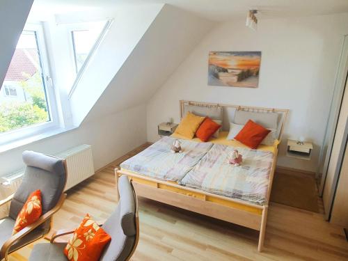 Llit o llits en una habitació de Ferienwohnung Kost