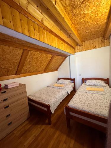 Postel nebo postele na pokoji v ubytování Guesthouse Nedajno