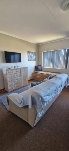 Ein Bett oder Betten in einem Zimmer der Unterkunft 9 Bayview Gonubie Seaside
