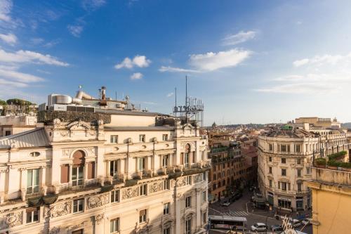 a view of the city from a building at Hotel 87 eighty-seven - Maison d'Art Collection in Rome