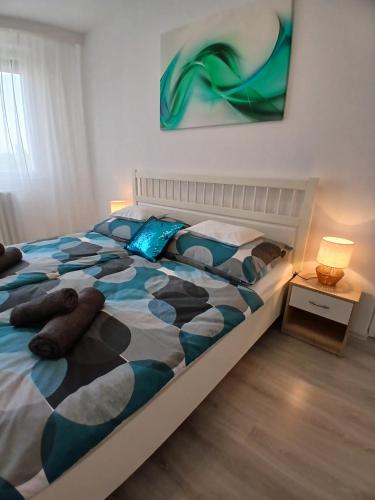 Katil atau katil-katil dalam bilik di Yvette Apartman