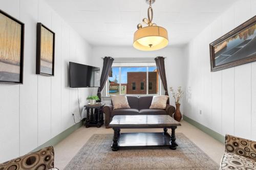 a living room with a couch and a table at The Loft in Whitefish