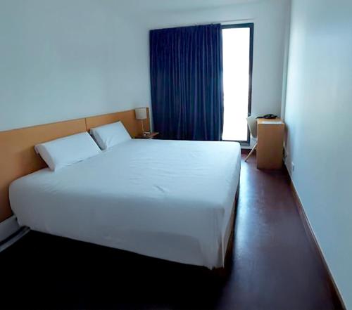 Postel nebo postele na pokoji v ubytování Room & Go by Lince