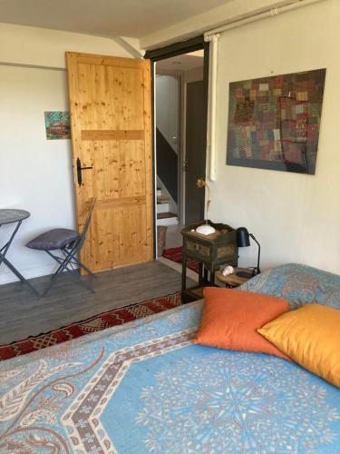 Katil atau katil-katil dalam bilik di Chambre d'hote Locronan