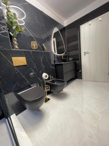 Koupelna v ubytování Marie Luxury Flat Coresi