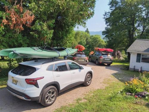 a car with a kayak on top of it at 10 Mi to Gore Mountain- Home in Adirondack Park home in Olmstedville