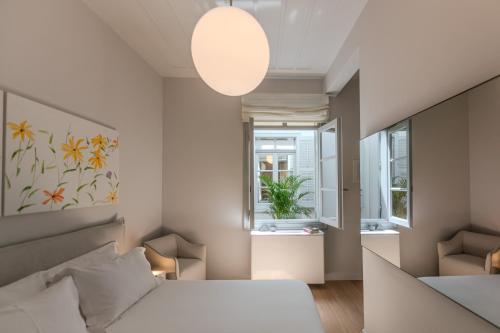 Χώρος καθιστικού στο Amalie Suites