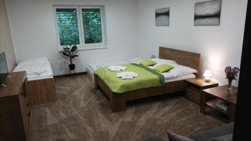 Postel nebo postele na pokoji v ubytování GÓL CENTRUM RESORT