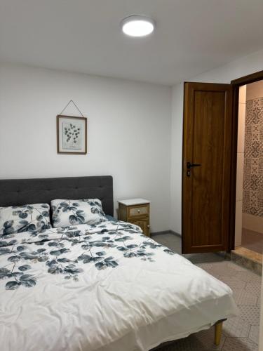 Postel nebo postele na pokoji v ubytování Garden House