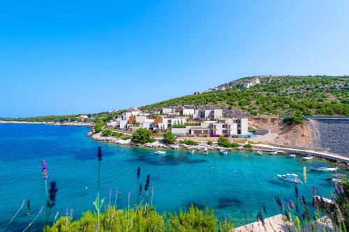 a view of a resort on a small island in the water at Villa Lavanda in Primošten