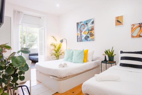 Ένα ή περισσότερα κρεβάτια σε δωμάτιο στο Soar Home l Graça l