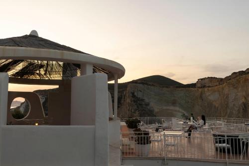 a building with a view of a mountain at Hotel Chiaia Di Luna in Ponza