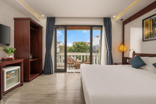 Postel nebo postele na pokoji v ubytování An Hotel