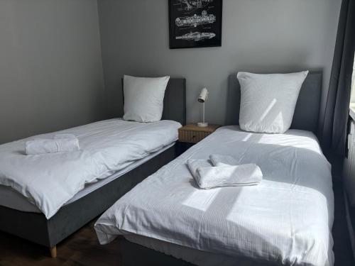 Postel nebo postele na pokoji v ubytování Hala Hostel - Pokoje na wyłączność tuż przy Dworcu Gdynia