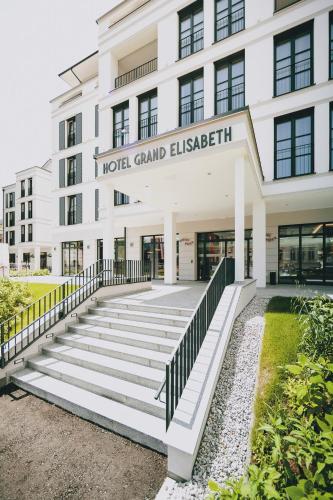 a white building with a sign that reads north grandellez at Grand Elisabeth in Bad Ischl