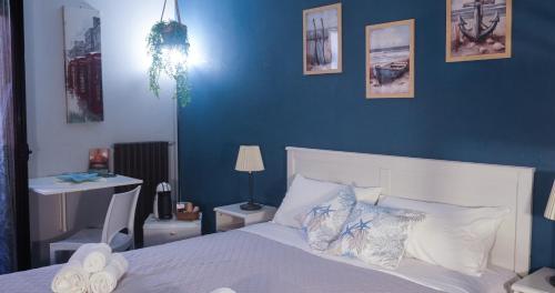 Postel nebo postele na pokoji v ubytování Al Bastione B&B