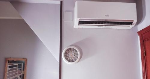 a air conditioner is hanging on a wall at Al Bastione B&B in Barletta