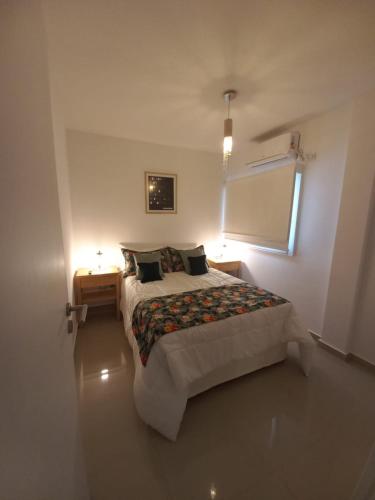 Katil atau katil-katil dalam bilik di Tanguero Appartment