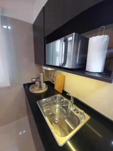 Dapur atau dapur kecil di Tanguero Appartment